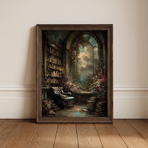 May include: A framed wall art print depicting a dark, moody library interior with a tufted leather armchair, tall bookshelves filled with books, and a large arched window overlooking a lush, overgrown garden with colorful flowers and cloudy skies.