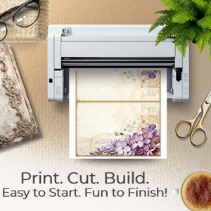 Hands hold an open journal featuring blue floral Whispered Blooms pages with layered blossoms and antique paper details. The soft wooden background and floral styling emphasize tactile creativity. Text reads “Glow Up Your Craft Stash,” suggesting use for junk journaling, memory keeping, and decorative paper crafting.