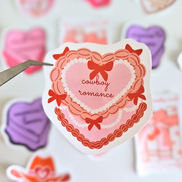 Heart cake sticker, red cowboy romance themed book trope