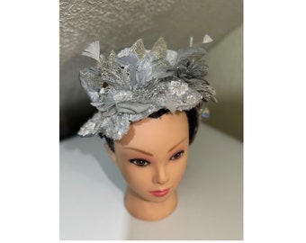 Silver with feathers, sequin and flowers fascinators, hat (headband)