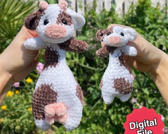 May include: Two handmade crochet cow plushies. The cows are white with brown spots and accents, including the ears, hooves, and a udder. The plushies have black eyes and pink noses. The text "Digital File" is on a red sticker in the bottom right corner.
