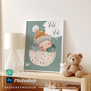 May include: A framed illustration of a cartoon character wearing a winter hat and sleeping inside a cup. The illustration is on a light blue background with white snowflakes. The frame is white and the text "Psd File" is written in black on a white background in the upper right corner of the illustration.