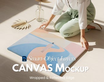 May include: A canvas mockup with a colorful abstract design featuring blue, pink, and peach tones. The canvas is being held by a person. The text "CANVAS Mockup" is displayed on the canvas. The canvas has a wrapped and reflected edge.