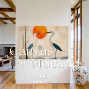 May include: A canvas print featuring a minimalist painting of three birds with a large orange circle in the background. The birds are white, blue, and gray. The painting is hanging on a white wall in a modern home.