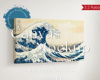 May include: Canvas wall art featuring a classic Japanese wave design in shades of blue and white. The artwork is a wrapped canvas with the text "Canvas Mockup" and "Wrapped Canvas". The background is a neutral color.