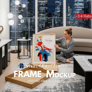 May include: A framed art mockup with the text "Your Design Here" and a colorful abstract floral design. The frame is held by a person in a room with a city view. The words "FRAME Mockup" are displayed.