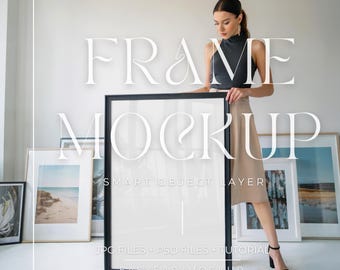 May include: A black frame mockup with a woman holding it in front of a white wall. The frame is empty and has a smart object layer. The text "FRAME MOCKUP" is written in white above the frame and the text "SMART OBJECT LAYER" is written in white below the frame. The text "JPG FILES + PSD FILES + TUTORIAL" is written in white below the frame. The text "EASY EASY MOCKUP" is written in white below the frame.