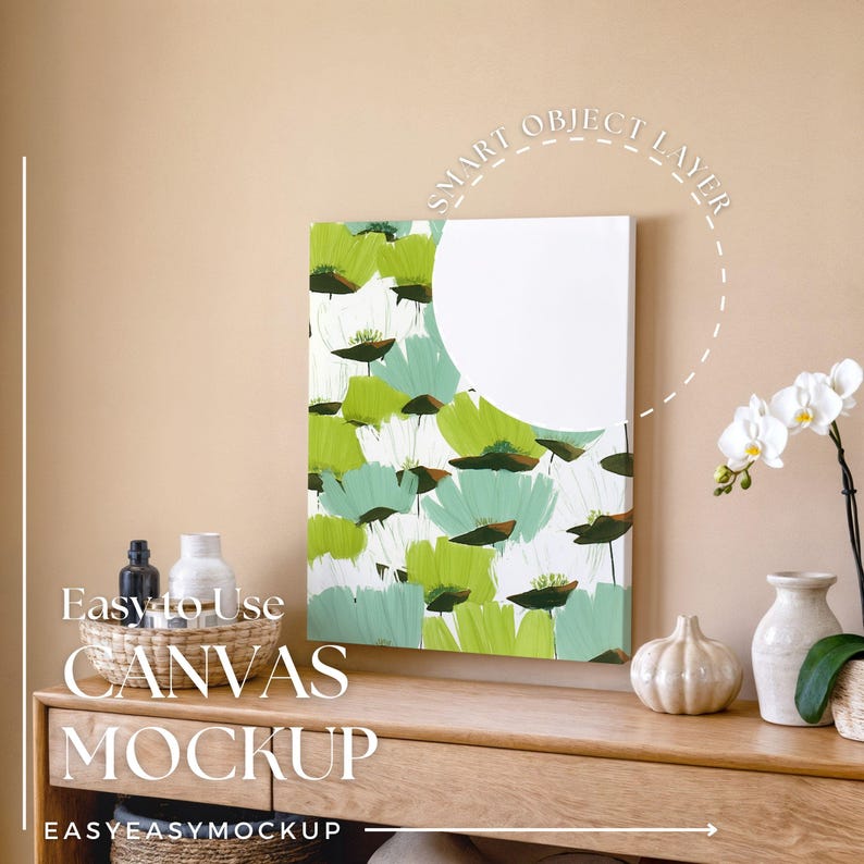May include: A canvas mockup featuring a floral design in shades of green and white. The canvas is displayed on a wooden surface, with decorative vases and an orchid plant. Text on the image reads "Easy to Use CANVAS MOCKUP".