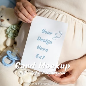 5x7 Baby Shower Greeting Card Mockup PSD JPG, Pregnant Mom Holding Invite with Teddy Pacifier Toys, Gender Reveal Nursery Scene