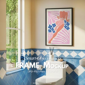 May include: A framed art print with a pink and coral figure and blue floral details, displayed in a bathroom with blue and white tiles. The text "FRAME Mockup" is visible. The artwork is above a white toilet.