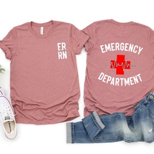 a pair of t - shirts with the words emergency department printed on them