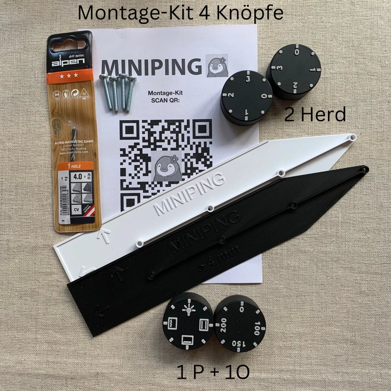 May include: A kit with black and white components, including two black dials with white numbers, two white and black guides, and a drill bit package. The text "MINIPING" is visible on the guides and the packaging. The kit also includes screws.