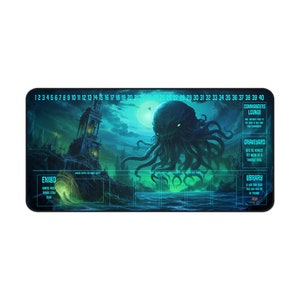 May include: A blue and green gaming playmat with a large, multi-tentacled, green creature with glowing red eyes. The playmat has a grid of 40 squares and includes sections for a graveyard, library, commanders lounge, and exiled cards.