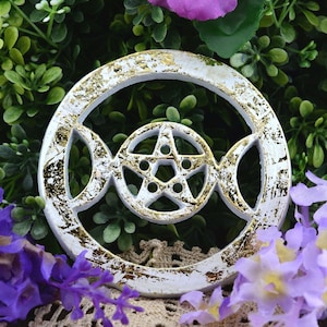 May include: White wooden circle with a gold pentagram and triple moon symbol. The circle has a distressed, aged look.