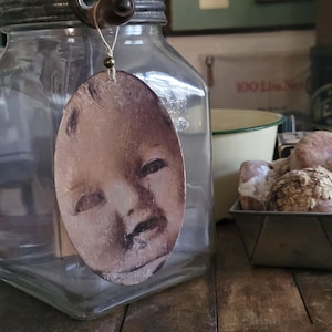 Creepy Doll Ornament – Handmade Gothic Halloween Décor with Photography on Wood