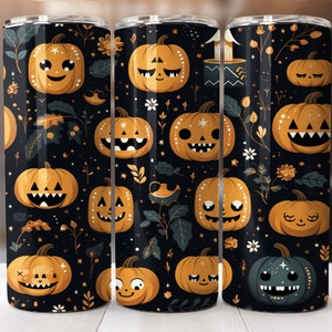 May include: Three stainless steel tumblers with a black background and a repeating pattern of orange pumpkins with different facial expressions. The pumpkins are surrounded by small white flowers, green leaves, and gold glitter.