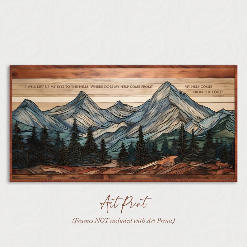 Op de afbeelding: Kunstafdruk met een berglandschap met blauwe en grijze toppen, groene bomen en een bruine houten lijst. De afdruk bevat de tekst "I WILL LIFT UP MY EYES TO THE HILLS. WHERE DOES MY HELP COME FROM?" en "MY HELP COMES FROM THE LORD."