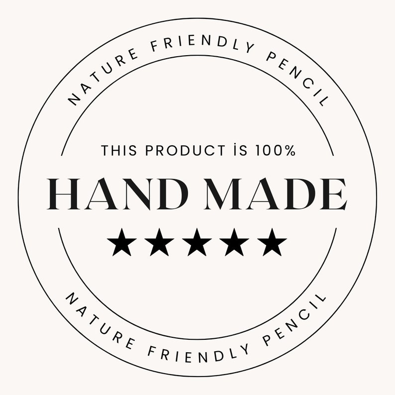 May include: Black and white circular stamp with the text "Nature Friendly Pencil" and "This product is 100% Hand Made" with five black stars.