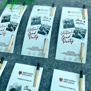 May include: A set of graduation party invitations with a pencil attached to each. The invitations are white with red and black text. The text reads "Sandy Spring High School cordially invites you Class of 2024's Virtual Grad Party".