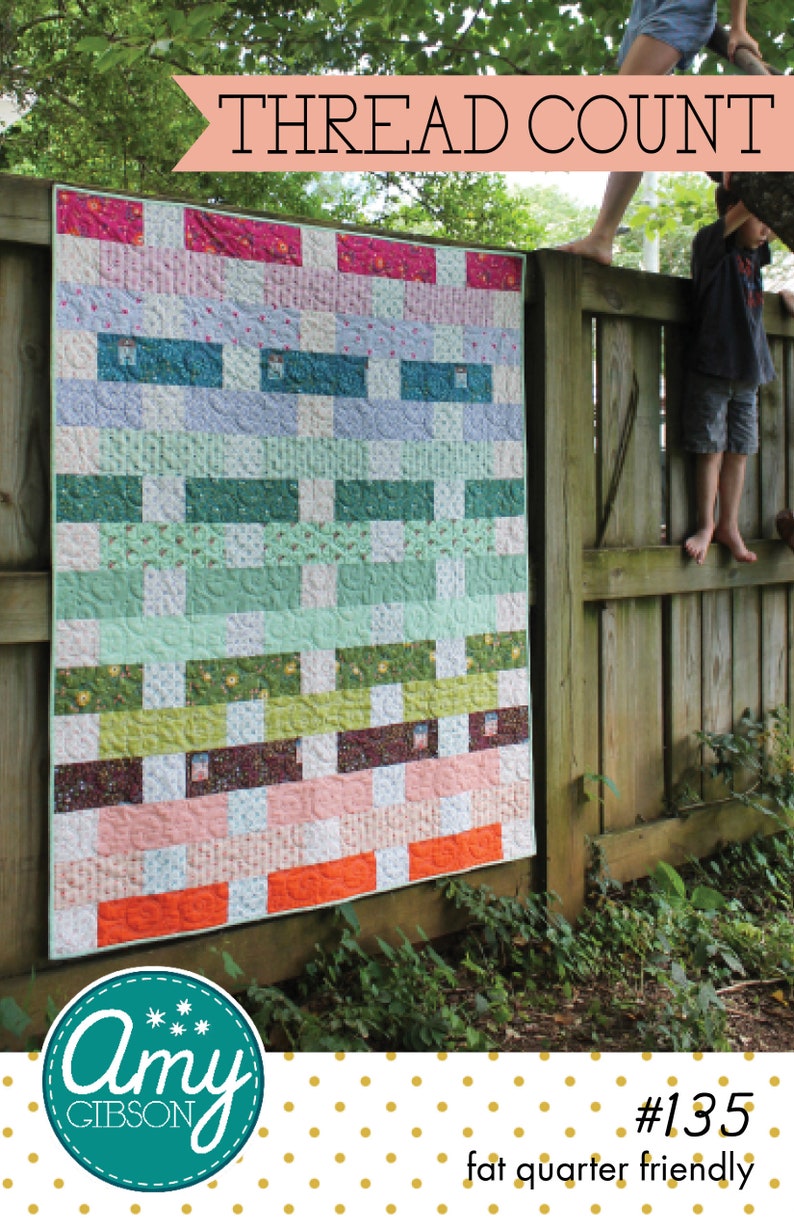May include: A colourful quilt pattern called "Thread Count" by Amy Gibson. The quilt is made with a variety of fabrics in shades of pink, green, blue, and white. The quilt is fat quarter friendly and is numbered #135.