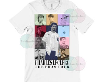 May include: White t-shirt with a collage of photos of a man in different stages of his life. The text "CHARLES LECLERC THE ERAS TOUR" is printed below the photos.