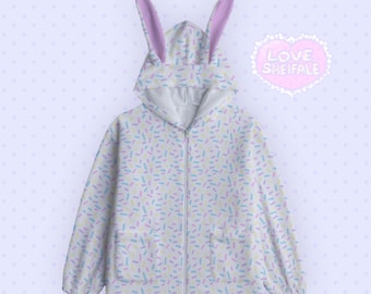 Sudadera con capucha y orejas de conejo con chispas de caramelo blancas