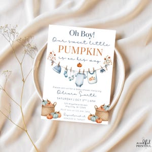 Editable Oh Bpy little pumpkin baby shower invitation template with fall-themed clothesline blue baby boy design, pumpkins, and cozy autumn accents , customizable in Canva, digital 5x7 printable invite for fall baby shower celebrations. pumpkin baby invite, fall baby shower, autumn shower invite, little pumpkin card, rustic baby shower, editable fall invite, canva baby template, baby shower printable, cozy fall invitation, digital baby invite, harvest shower invite, gender neutral invite