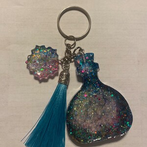 Glitzernder Glas Schlüsselanhänger mit Blumen Gemme
