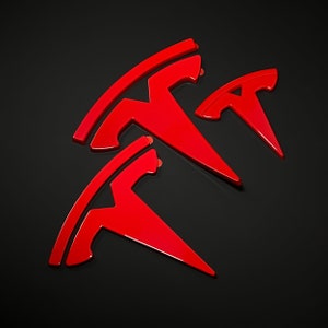 May include: Three red Tesla logos in different sizes, stacked on top of each other against a black background.