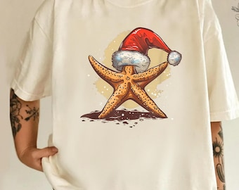 Beach Christmas Shirt Starfish Santa Hat Tee | Coastal Holiday T-Shirt | Funny Ocean Christmas Shirt | Tropical Xmas Gift family friends Tee