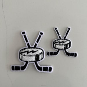Hockey Patch “Stick and Puck”, 4”  Chenille & Embriodery on felt, Iron or Sew on
