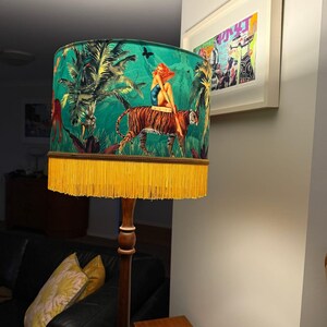 May include: A set of three ceramic mugs with a speckled, matte finish. The mugs are in shades of cream, light gray, and dark gray. Each mug has a simple, minimalist design, perfect for coffee or tea.