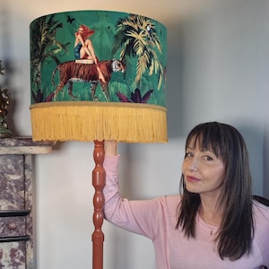 May include: A set of three ceramic mugs with a speckled, matte finish. Each mug features a different color: light blue, cream, and gray. The mugs have a simple, modern design and a comfortable handle.