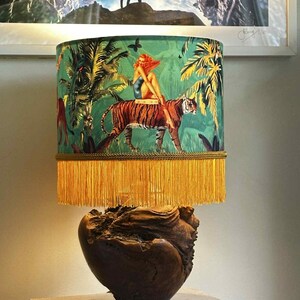 May include: A set of three ceramic mugs with a speckled, matte finish. The mugs are in shades of cream, light gray, and dark gray. Each mug has a simple, minimalist design, perfect for coffee or tea.