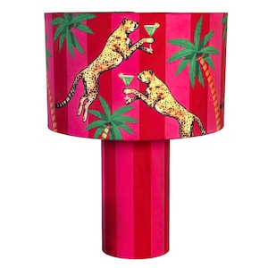 May include: A trio of ceramic mugs with a speckled, matte finish in cream, light grey, and dark grey. Each mug features a simple, minimalist design, ideal for tea or coffee.