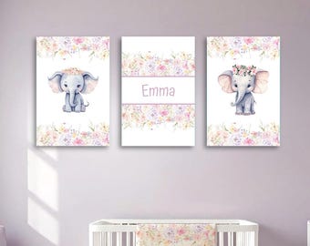 May include: Three watercolor prints featuring a cute elephant with a floral crown and pink flowers. The middle print has the name "Emma" written in pink.