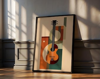 May include: A framed art print featuring a stylized guitar design. The artwork uses geometric shapes in shades of orange, green, and brown, with a black guitar silhouette. The print is displayed on a wooden floor, leaning against a wall.