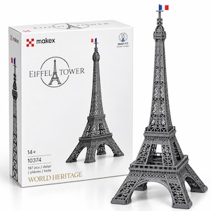 May include: A grey Eiffel Tower model kit with 187 pieces and a snap-fit design. The packaging box displays the text "EIFFEL TOWER," "makex," "14+," "10374," "187 pcs / delar / pièces / teile," and "WORLD HERITAGE" with a small French flag on top.