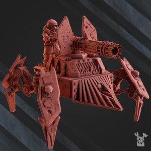 May include: A detailed, reddish-brown miniature war machine with a soldier figure. The model features a large cannon, protective shields, and mechanical legs. Skulls are incorporated into the design, adding a thematic element.