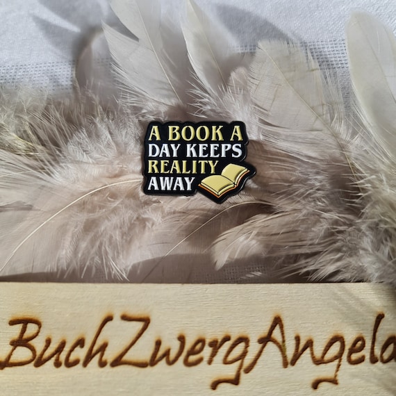 Pin A book a day keeps reality at bay