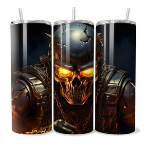 May include: A stainless steel tumbler with a skull design. The skull is made of metal and has glowing yellow eyes. The background is black.