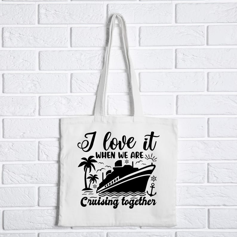 May include: White tote bag with black text and a silhouette of a cruise ship. The text reads "I love it when we are cruising together".