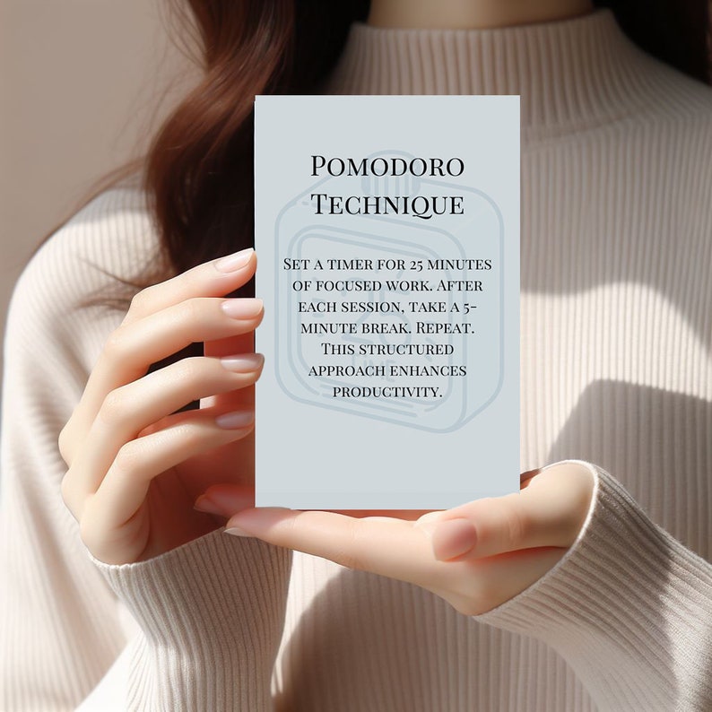 Peut inclure: Une carte bleue avec le texte "Pomodoro Technique" et des instructions pour utiliser la technique Pomodoro. Les instructions indiquent de r&eacute;gler un minuteur sur 25 minutes de travail concentr&eacute;, puis de prendre une pause de 5 minutes, et de r&eacute;p&eacute;ter.