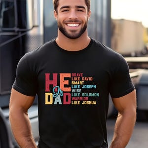 Christian dad shirt with bold Bible hero traits, faith-based Father&#39;s Day gift, He is Dad graphic tee for religious fathers, daddy shirt