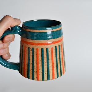 Handmade Striped Ceramic Mug – 13 oz Pottery Mug with Thumb Rest, Teal & Orange Lines, Rustic Modern Coffee Mug, Stoneware Coffee Mug
