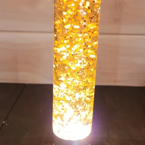 Lampe lave socle argent bulles jaunes