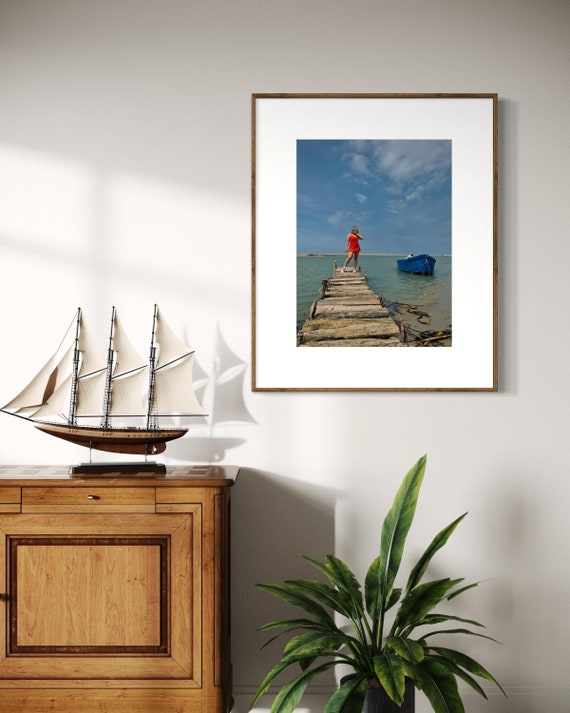 Rustic Pier Photography Print, Coastal Beach House Wall Art, Red Dress and Blue Boat Seascape, Limited Edition Decor - Banksy Art Inspired