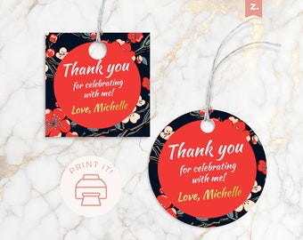 May include: Two gift tags with floral designs. One is square, the other is round. Both have a red circle with the text "Thank you for celebrating with me! Love, Michelle." The background is navy blue with red and white flowers.