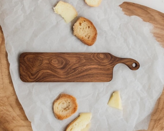 Rectangular wooden presentation board with curved handle