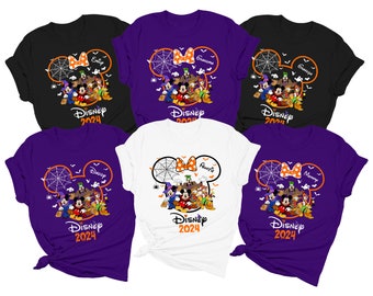 May include: A collection of Halloween-themed Disney t-shirts in black, purple, and white. Each shirt features a Mickey Mouse silhouette with a spiderweb, bow, and Disney characters. The text "Disney 2024" is printed on each shirt, along with different names.